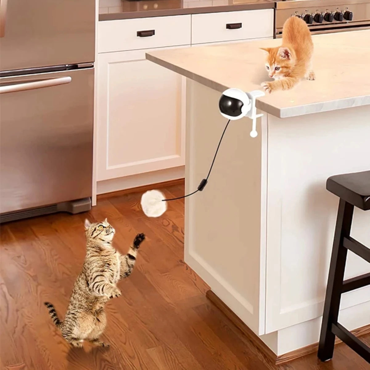 Get Your Cat's Paws in the Game with the 1Pc Lifting Ball Electric Motion Cat Toy – Round and Round They Go!